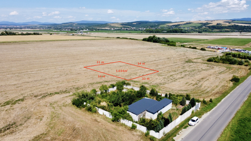 Investičný stavebný pozemok - Krásna