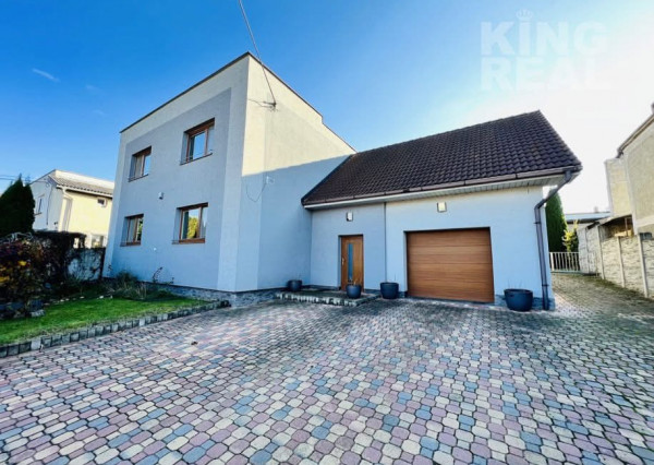 Priestranný rodinný dom s prístavbou a peknou záhradou